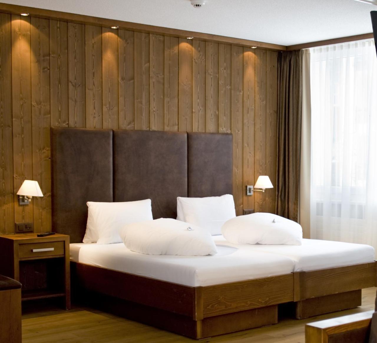 Hotel Quellenhof Leukerbad Bagian luar foto